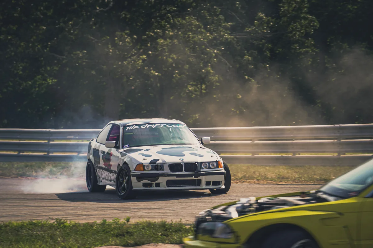 Drift car working the edge of the track surface
