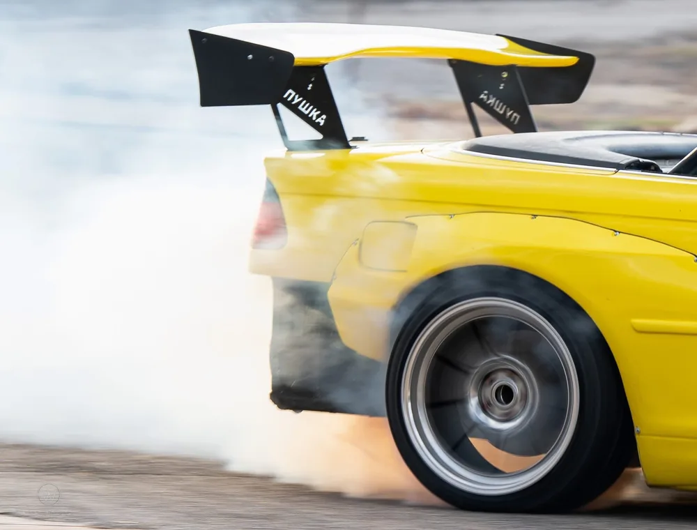 Wheel and tire detail on a track-prepared drift car
